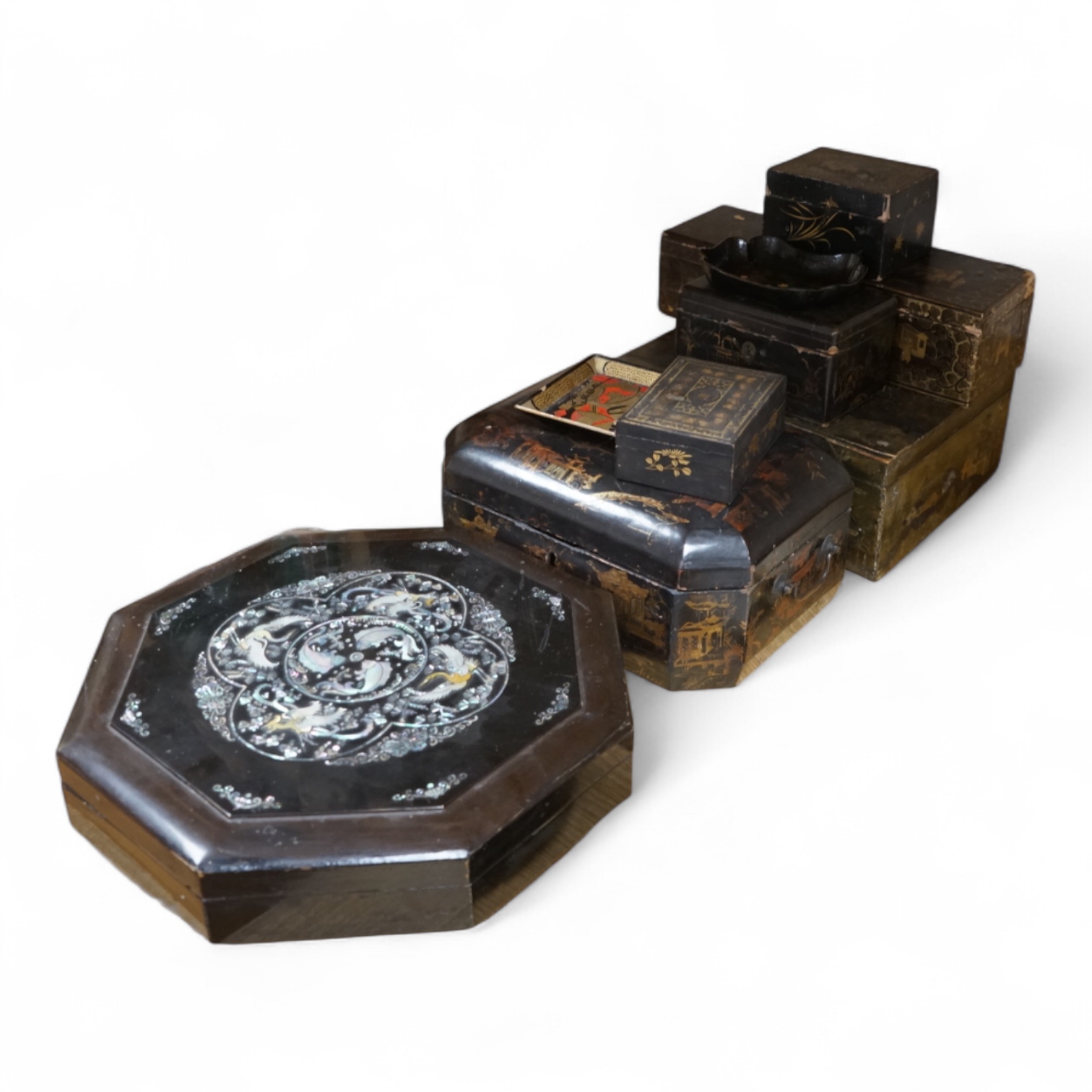 A group of 19th/20th century Chinese lacquer boxes, the largest 34cm wide
